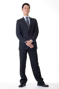 Handsome business man of Asian, full length portrait.