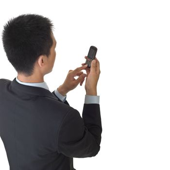 Business man holding cellphone with copyspace on white.