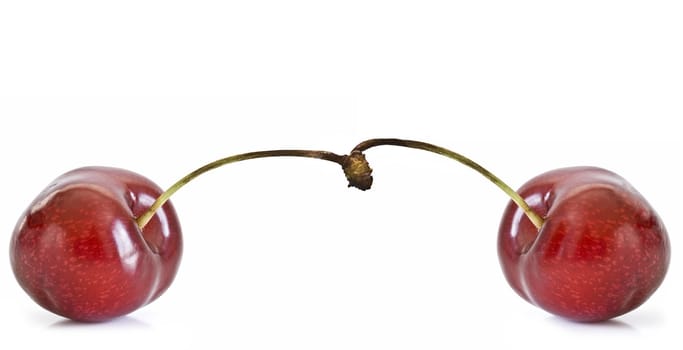 Cherries isolated on a white background.