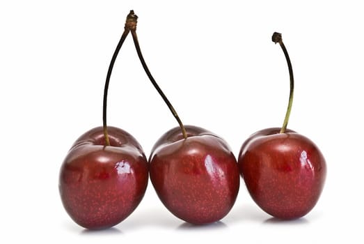 Cherries isolated on a white background.