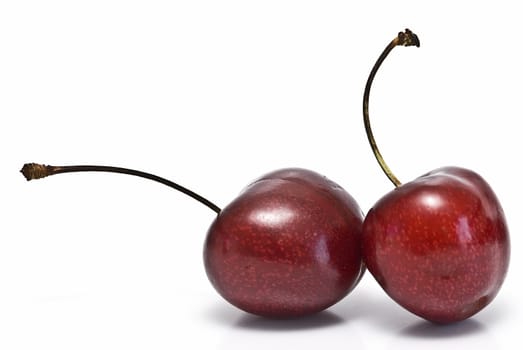 Cherries isolated on a white background.