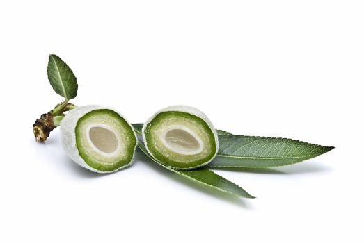 Green almonds isolated on a white background.