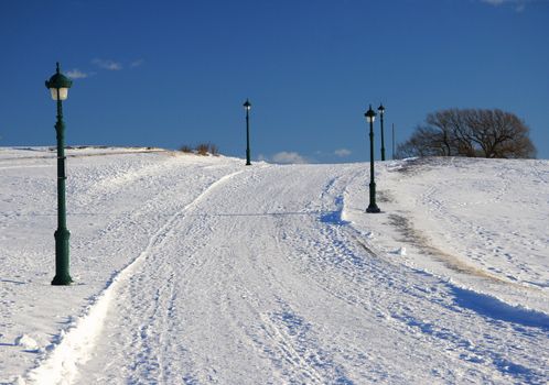 Peacefull snow road on the Planes of Abraham, Quebec City, Canadac