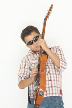 boy playing with a guitar over white