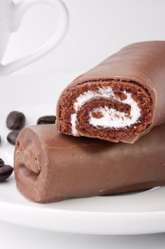 Chocolate rolled cake with a stuffing as a light meal.
