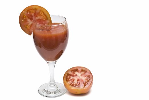 A cup of tomato juice on a white background.