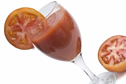 A cup of tomato juice on a white background.