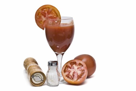 A cup of tomato juice on a white background.