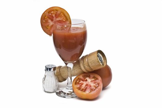 A cup of tomato juice on a white background.