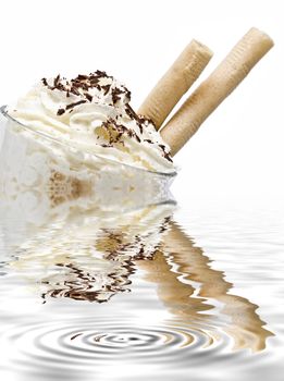 A cup of coffee with whipped cream on a white background.