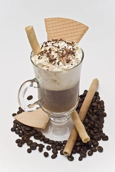 A cup of coffee with whipped cream on a white background.