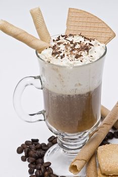 A cup of coffee with whipped cream on a white background.