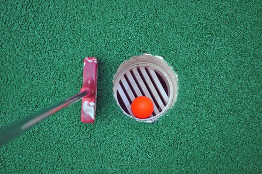 Miniature Golf Ball In The Hole