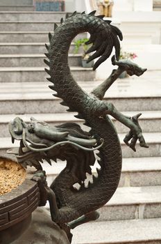 image of dragon on joss stick pot