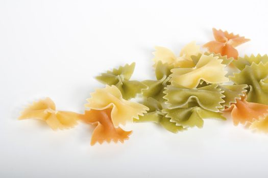 Farfalle pasta on white background