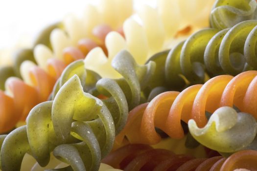 Closeup of dried multicolored fusilli pasta