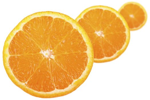 Three orange slices with shallow depth of field