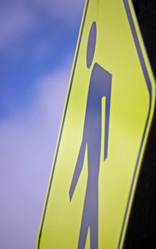 People Crossing Street Sign