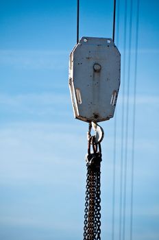 Closeup of large hook of construction crane on site