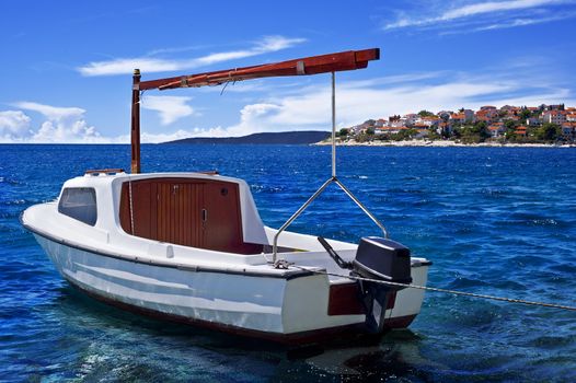 boat and typical coastline in trogir, croatia