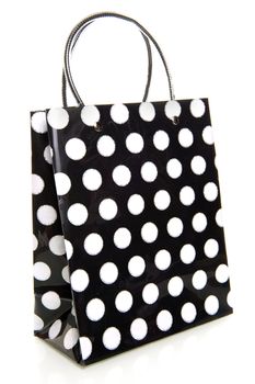 a dotted bag in black and white