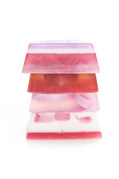 four pieces of colorful soap