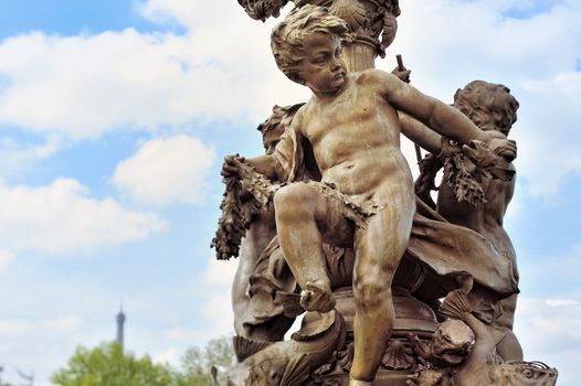 Sculpture cherubs at the lamppost on the bridge Alexander's III in Paris. Photo with tilt-shift lens