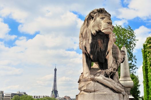 Sculpture lion on the bridge Alexander's III in Paris. Photo with tilt-shift lens