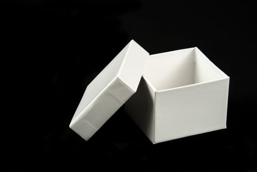 pictures of a square and white cardboard box