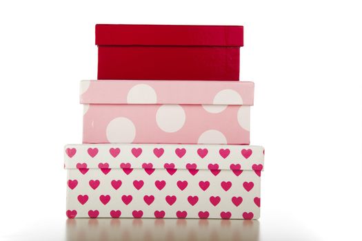 Stack of three decorative boxes on white background.