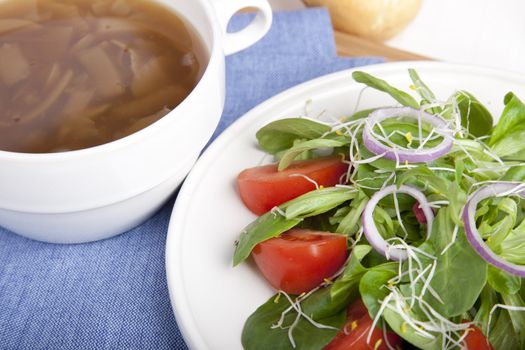 Onion soup with fresh green salad.