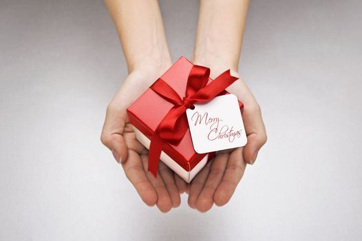 christmas gift with decrative red ribbon bow