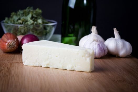 Block of fresh Italian Parmesan cheese.