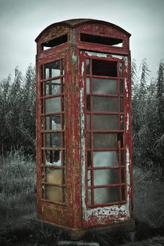 Decaying red telephone boxe, northern Ireland