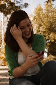 A portrait of a woman in her mid tweenties. 