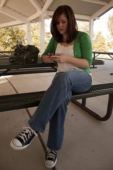 A portrait of a woman in her mid tweenties. 