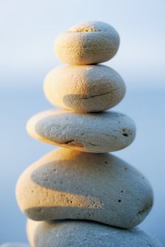 Pile of white pebbles in the balance