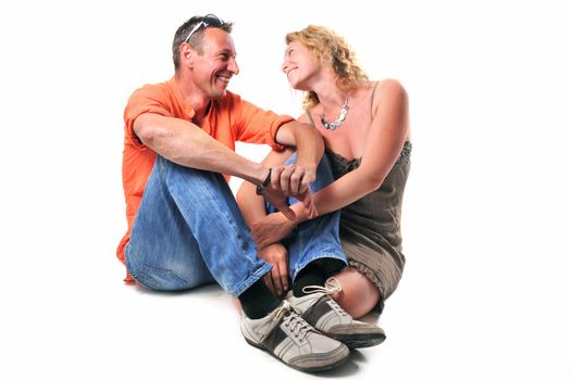 Romantic young couple in front of white background