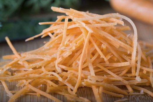 Close up of finely shredded carrots.