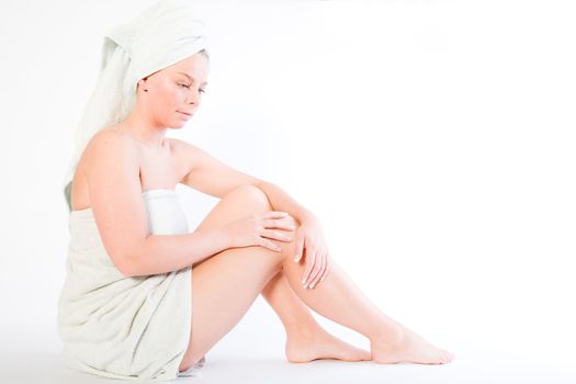 Studio portrait of a spa girl sitting