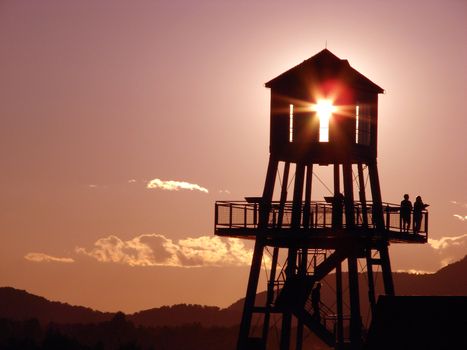 Observation tower in silhouette at sunset in Magog, province of Quebec, Canada