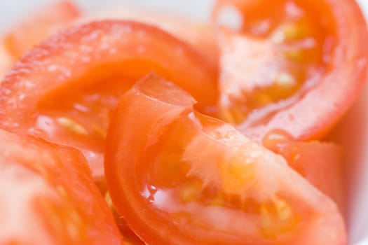 pieces of cutted tomato cloes up