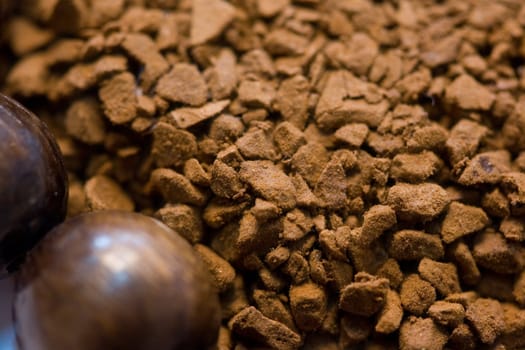 instant coffee and wooden decoration close-up