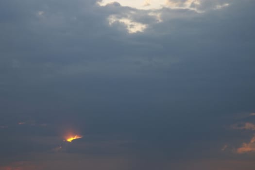 dark heavy cloud and sunny ray
