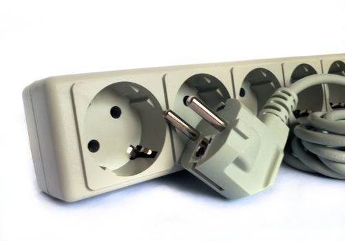 Electric plug and outlet in gray tone on white