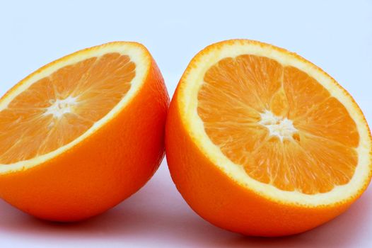 two halves of orange isolated on the white background