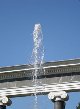 fountain, column and blue sky
