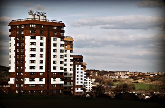 Social housing tower blocks progressing down a hill