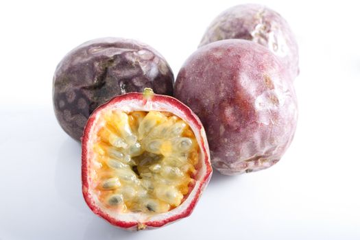 Three whole and one half passion fruit.