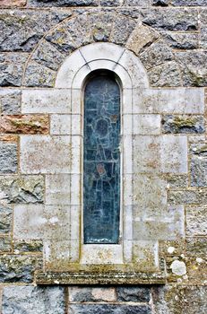 An old church window showing much detail and texture